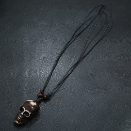Hand-woven resin skull necklace
